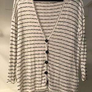 Loose oversized cardigan sweater in strips